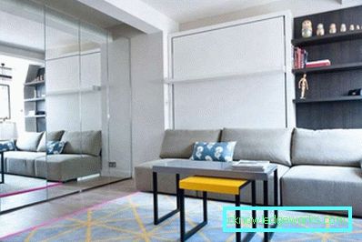 Sala de estar y dormitorio en una habitación de 20 metros cuadrados - fotos reales interiores